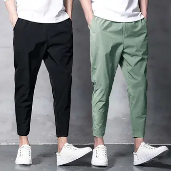 2023 Пролет и лято Мъжки харем панталони Дължина до глезена Разтегливи панталони Мъже Капри-панталони Корейски торбести мъжки джогъри Потни панталони