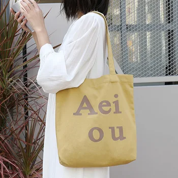 Японски случайни и артистични платно чанта ins минималистичен писмо отпечатани голяма пазарска чанта окото червена мода измити рамо чанта за жени